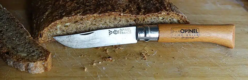 Opinel N°10 Carbon W Bread On Wood