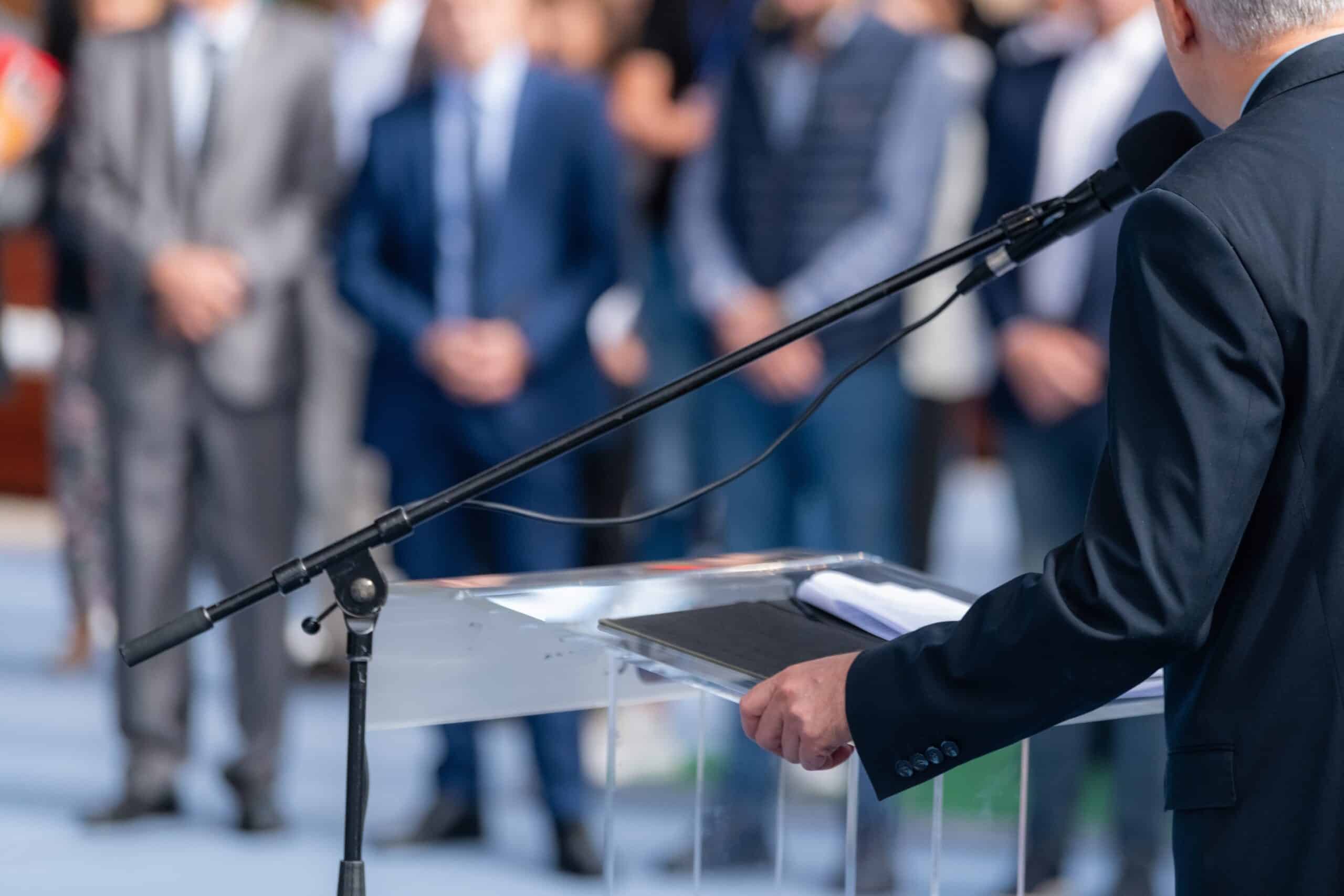 Political,campaign,before,elections,with,a,political,candidate,addressing,an