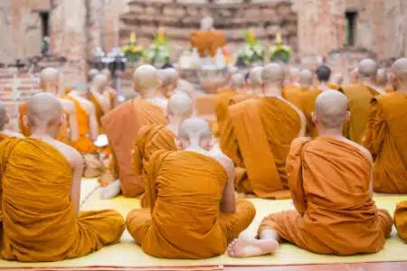 Monks,praying,in,temple,of,ayutthaya,,thailand.