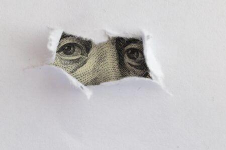 Secret,money,concept,eyes,behind,white,paper
